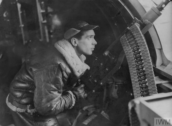 306th Bomb Squadron waist gunner Staff Sergeant Charles D. Hill from Baltimore, Maryland, mans...jpg