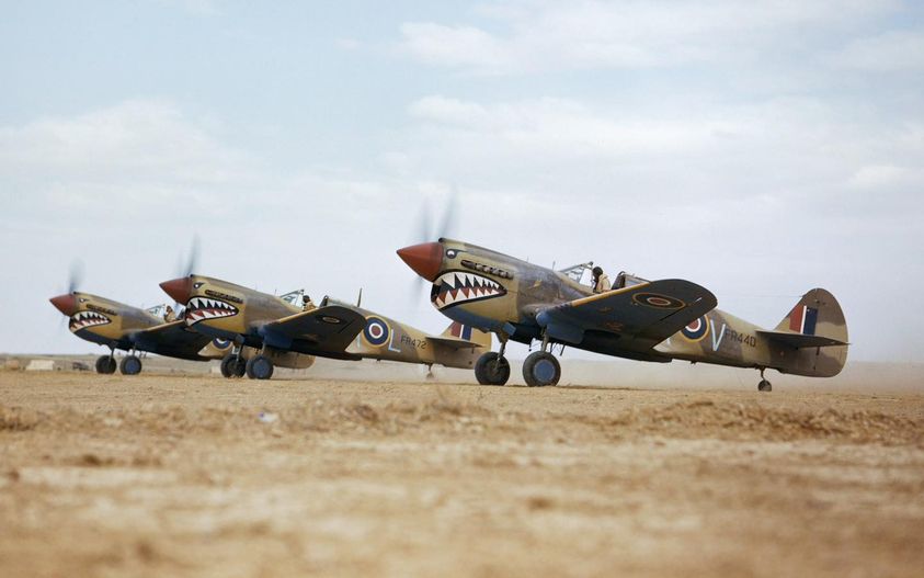 Curtiss Kittyhawk Mk IIIs ( depart from Medenine Tunisia on a sortie.jpg