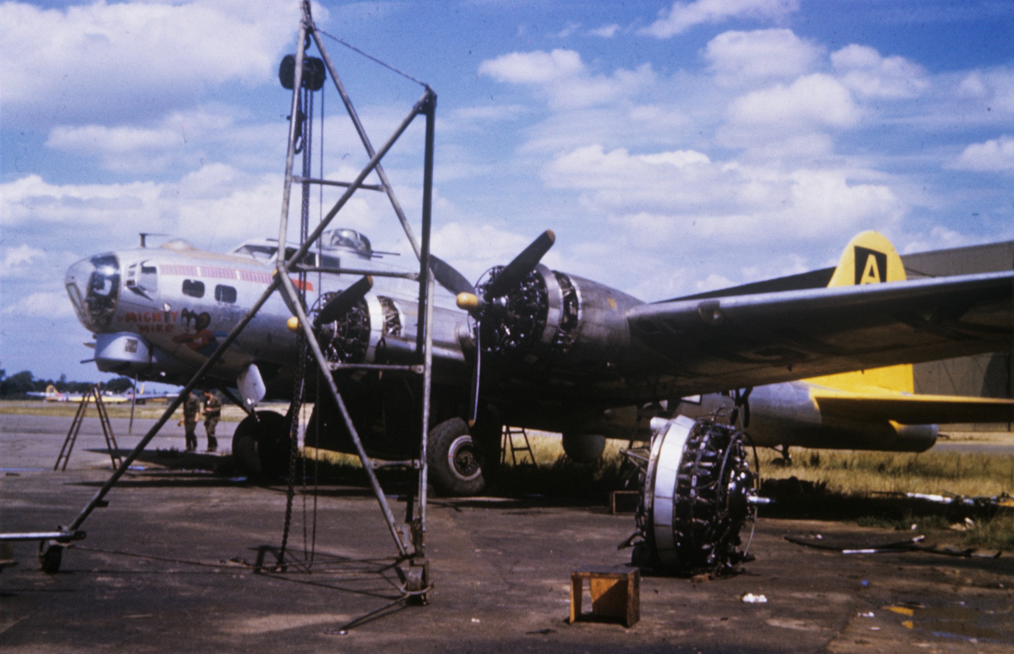 Ground personnel of the 94th Bomb Group work on a B-17.jpg