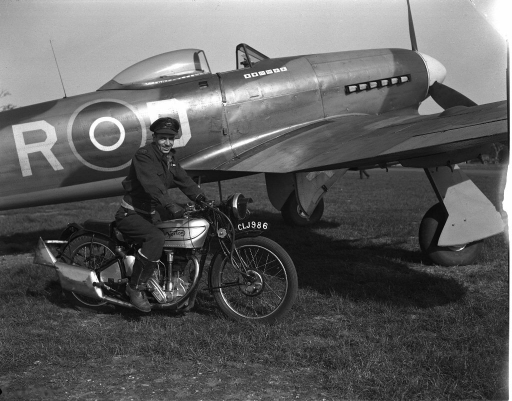 Lewis E. Park Jr. of 438 Squadron RCAF on his Norton motorcycle in front of Hawker Typhoon.jpg