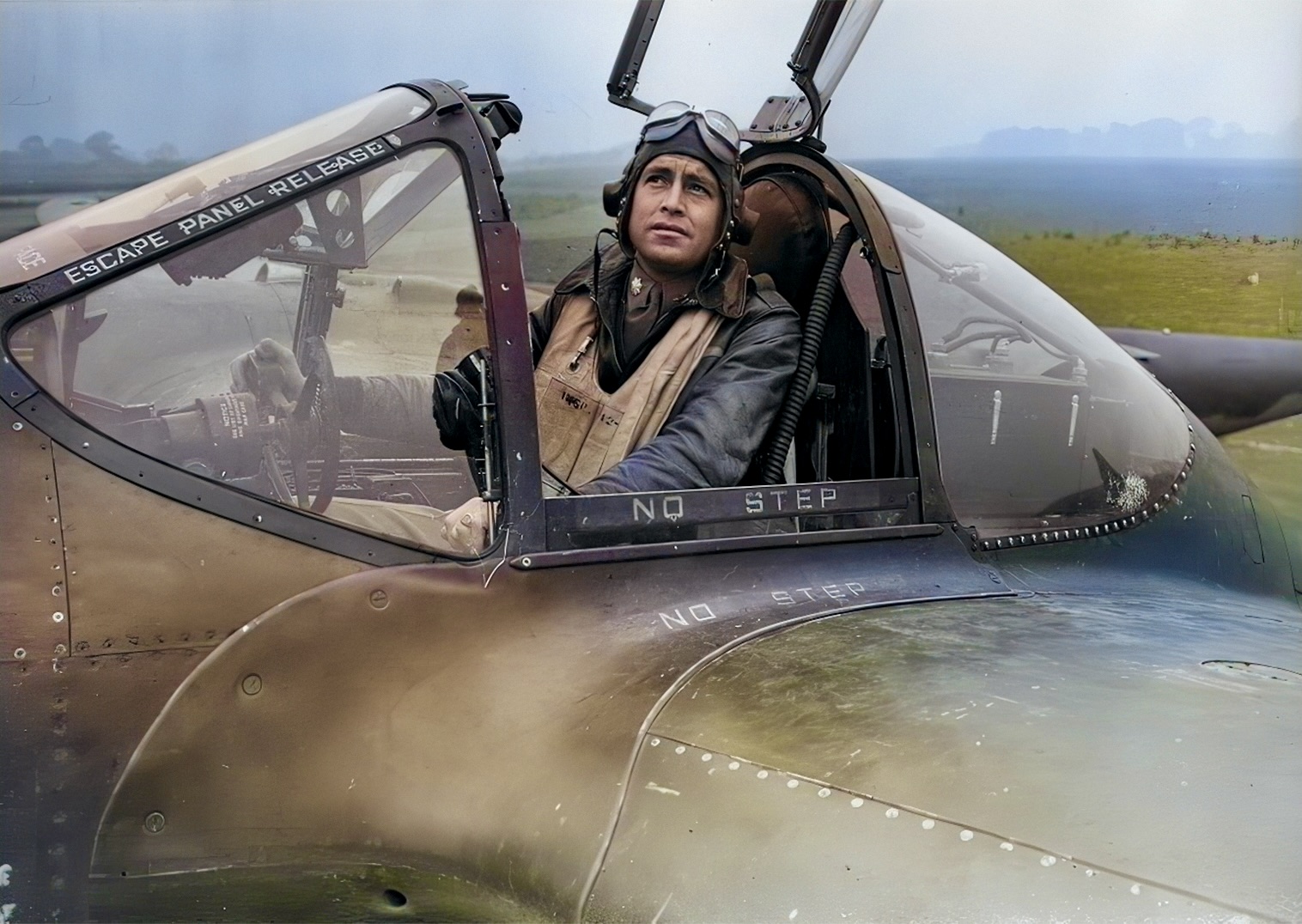 Lieutenant-Colonel Jack S. Jenkins, CO of the 55th Fighter Group, sits in cockpit of P-38 Ligh...jpg