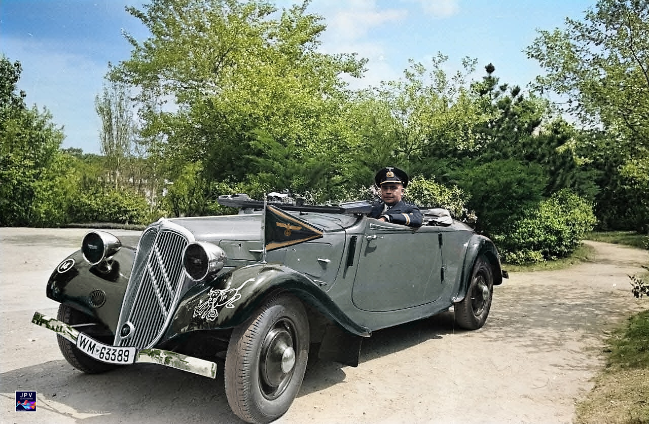 Oberleutnant (Ing) Erich Zürn, chief engineer on the U-48, on board a Citroën 7 CV convertible...jpg