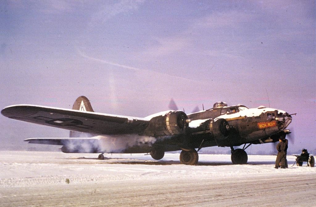 Original color photo of Ragin' Red II, a B-17F belonging to the 379th Bomb Group, starting up ...jpg